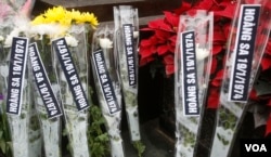 越南数十名抗议者星期二在河内市中心集会，纪念1974年的黄沙海战（中国称西沙之战）42周年(2016年1月16日)。