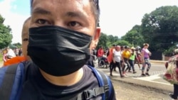 來自浙江的盧先生背著四歲的兒子，從南美洲步行北上，穿越墨西哥到美國 (照片本人提供）