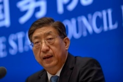 中国国家卫健委副主任曾益新在国务院新闻办公室在北京举行的记者会上讲话。(2021年7月22日)