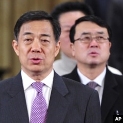 中共重庆市委书记薄熙来（左）和重庆市副市长王立军（右）（资料照）。