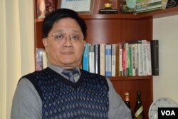 經濟學者關焯照。（美國之音湯惠芸攝）