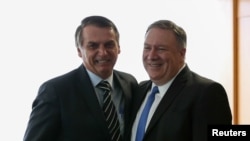 美國國務卿蓬佩奧（右）2019年1月2日會見巴西新總統博爾索納羅（路透社）