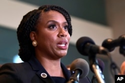Rep.-elect Ayanna Pressley, Democrat-Massachusetts, listens during a news conference with members of the Progressive Caucus in Washington, Nov. 12, 2018.