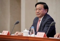 美中貿易談判中方團隊成員、中國農業部副部長韓俊在北京出席相關美中貿易談判的記者會。（2019年12月13日）