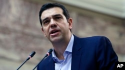 希臘總理齊普拉斯就延長救助計劃發表演講。