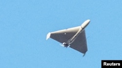 资料照 - 照片为2022年7月俄罗斯军队对乌克兰首都基辅进行无人机攻击。乌克兰当地官员说，参加攻击的是伊朗制造的Shahed-136（见证者-136)型无人机。