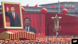 中共建政70週年的閱兵式上的中共領導人習近平畫像。 （2019年10月1日）