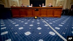 Top U.S. diplomat in Ukraine William Taylor (2nd-R), with career foreign service officer George Kent (2nd-L), testifies in impeachment hearings before the House Intelligence Committee on Capitol Hill in Washington, Nov. 13, 2019.