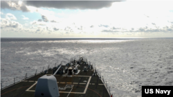 美军伯克级驱逐舰拉塞尔号(USS RUSSELL DDG-59)2021年2月17日在中国所说的南沙群岛海域航行（美国海军照片）