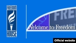 A man arranges "Rakhis" or sacred threads as he waits for customers at his roadside stall ahead of the Hindu festival Raksha Bandhan celebrations, in Kolkata, India.