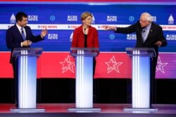 From left, Democratic presidential candidates, former Mayor Pete Buttigieg, Sen. Elizabeth Warren, D-Mass., and Sen. Bernie Sanders, I-Vt., participate in a Democratic presidential primary debate, Feb. 25, 2020, in Charleston, S.C.