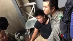 香港北角一名穿黑衣男子被近十名人士圍毆