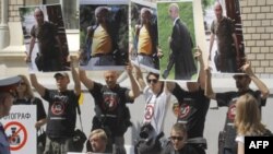 Протесты в поддержку арестованных фоторепортеров