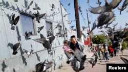 Black smoke rises from a fire at warehouses in Beirut, Lebanon. A huge fire broke out at the Port of Beirut, triggering panic among residents traumatized by last month&#39;s massive explosion.