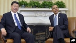 中国国家副主席习近平2012年2月１４日在白宫与美国总统奥巴马会晤。