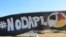 A banner protesting the Dakota Access oil pipeline near North Dakota's Standing Rock Sioux reservation.