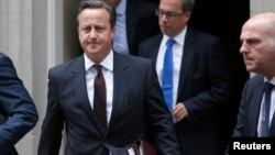 Smoke billows following a reported air strike on a rebel-held area in the southern Syrian city of Daraa.