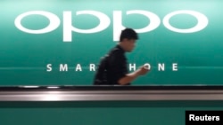 中國手機品牌Oppo在新加坡的廣告展牌（2014年5月8日）