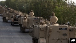 巴基斯坦军人在该国北瓦济里斯坦乘坐的军事车辆