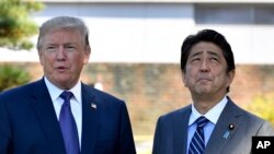 日本首相安倍（右）和美國總統川普。