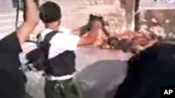 紐約時報刊登的處決敘利亞士兵的錄像和照片令人感到恐怖。