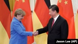 2018年5月德國總理默克爾訪華與中國國家主席習近平見面資料照。