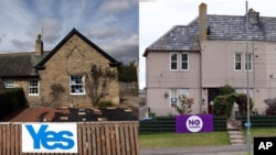 2014年9月8日,蘇格蘭埃克爾斯一個支持獨立的標語牌（左）以及蘇格蘭伯恩茅斯一個反對獨立的標語牌（右）。