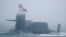 中國海軍一艘094A型晉級彈道導彈核潛艇在青島附近海域參加海軍檢閱。（2018年4月23日）