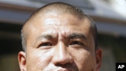 緬甸佛教僧侶甘比拉一月19日在仰光的照片