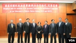 台灣外交部舉辦台菲“有關促進漁業事務執法合作協定”完簽茶會 (美國之音李逸華拍攝)