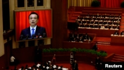 3月15日李克强在人大开幕式上作政府工作报告