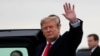 U.S. President Donald Trump waves as he arrives at Akron-Canton airport in Canton, Ohio, March 20, 2019.