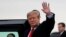 U.S. President Donald Trump waves as he arrives at Akron-Canton airport in Canton, Ohio, March 20, 2019.