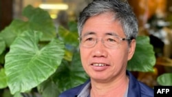 ແຟ້ມຮູບ-ຮູບທີ່ຖືກຖ່າຍໃນວັນທີ 10 ເມສາ 2021 ນີ້, ສະແດງໃຫ້ເຫັນພາບຂອງນັກຂ່າວ ເທຣືອງ ຮຸຍ ຊານ (Truong Huy San), ເຊິ່ງຮູ້ໃນອີກຊື່ນຶ່ງວ່າ ຮຸຍ ດັກ (Huy Duc), ໃນລະຫວ່າງການຢ້ຽມຢາມຮ່າໂນ່ຍ, ປະເທດຫວຽດນາມ.