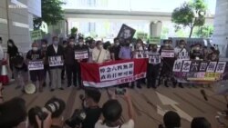 被控非法組織香港六四燭光晚會的 13人出庭應訊