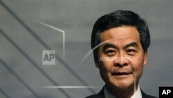 Piles of mannequin limbs are seen outside the Russian embassy in London - they are part of a protest against military action in Syria.