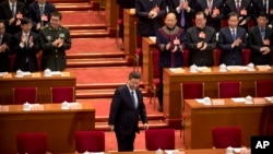 中国国家主席习近平2019年3月13日抵达北京人大会堂参加中国人大会议。