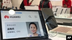 华为北京公司电脑展示孟晚舟情况 （美联社2018年12月6日）