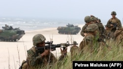 LITHUANIA -- U.S. soldiers take part in a massive amphibious landing during the Exercise Baltic Operations (BALTOPS), a NATO maritime-focused military multinational exercise, in Nemirseta on the Baltic sea, June 4, 2018