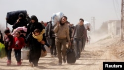 敘利亞大馬士革郊區東古塔居民逃離戰亂