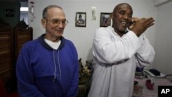 On a road leading to the U.S. embassy in Sanaa, protesters shout slogans against the anti-Islam film made in the U.S. mocking the Prophet Muhammad, September 21, 2012.