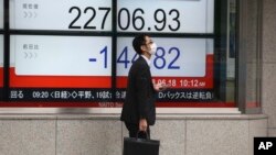 东京指数前一天（2018年6月18日）已经走低（美联社）