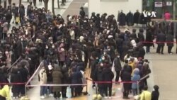 南韓人在全國各地排長龍購買口罩