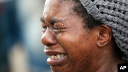 路易斯安那州民眾星期三燭光紀念一天前被警察開槍打死的男子