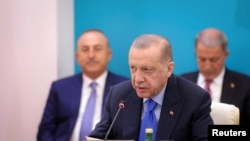 土耳其总统埃尔多安在德黑兰出席和平解决叙利亚冲突的国际会议（2022年7月19日）