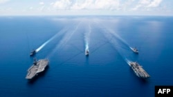 美國海軍“里根”號航母打擊群2019年10月6日在南中國海舉行演習。