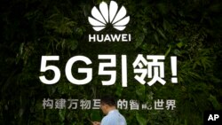 華為公司在中國信息通信展覽會上展示的口號。(2019年10月31日)