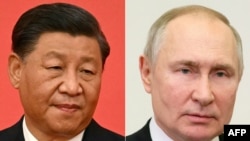 FILE - This combination of pictures shows China's President Xi Jinping and Russian President Vladimir Putin. Xi and Putin "held a video meeting at Beijing's Great Hall of the People on Jan. 21, 2025", state broadcaster CCTV said.