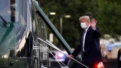 特朗普總統登上"海軍陸戰隊一號"直升機離開沃爾特·里德國家軍事醫療中心。(2020年10月5日)