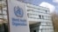 FILE PHOTO: A logo is pictured outside a building of the WHO in Geneva